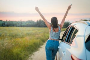 A girl with raised arms