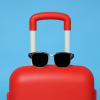 sunglasses on suitcase