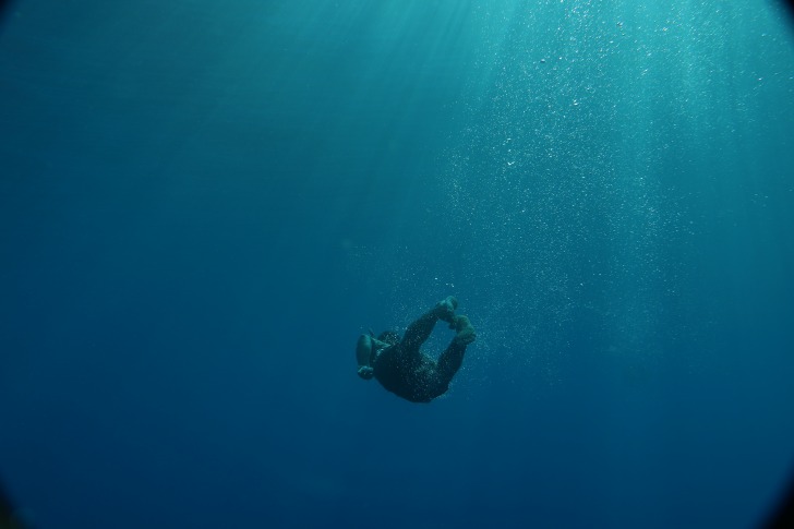 Scuba diver deep in the water